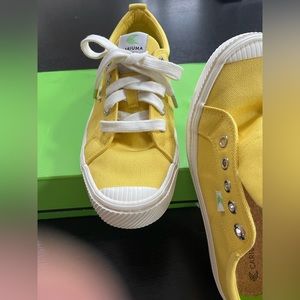 Cariuma yellow sneakers
